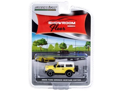 2023 Ford Bronco Heritage Ed Yellowstone Met. W/Oxford White Top "Showroom Floor" Series 3 1/64 Diecast Model Car By Greenlight 4 2023 Ford Bronco Heritage Ed Yellowstone Met. W/Oxford White Top "Showroom Floor" Series 3 1/64 Diecast Model Car By Greenlight - Image 2
