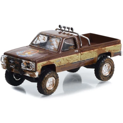 1982 GMC K-2500 Sierra Grande Pickup Truck Brown And Gold (Dirty Version) "Fall Guy" 1/64 Diecast Model Car By Greenlight 3 1982 GMC K-2500 Sierra Grande Pickup Truck Brown And Gold (Dirty Version) "Fall Guy" 1/64 Diecast Model Car By Greenlight