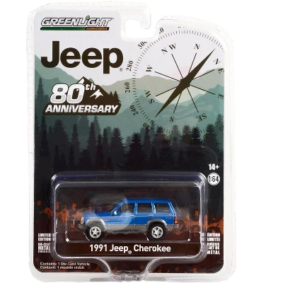 1991 Jeep Cherokee Blue Metallic With Red Stripes "Jeep 80th Anniversary Edition" 1/64 Diecast Model Car By Greenlight 4 1991 Jeep Cherokee Blue Metallic With Red Stripes "Jeep 80th Anniversary Edition" 1/64 Diecast Model Car By Greenlight - Image 2