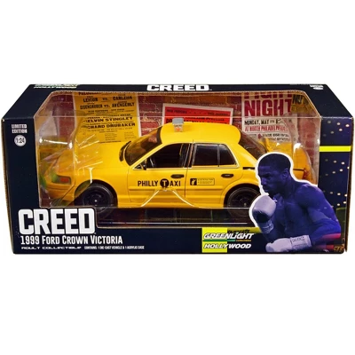 1999 Ford Crown Victoria "Philly Taxi" Yellow "Creed" (2015) Movie 1/24 Diecast Model Car By Greenlight 4 1999 Ford Crown Victoria "Philly Taxi" Yellow "Creed" (2015) Movie 1/24 Diecast Model Car By Greenlight - Image 2