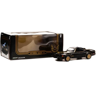 1977 Pontiac Firebird Trans Am T/A Starlite Black With Golden Eagle Hood And Stripes 1/24 Diecast Model Car By Greenlight 4 1977 Pontiac Firebird Trans Am T/A Starlite Black With Golden Eagle Hood And Stripes 1/24 Diecast Model Car By Greenlight - Image 2