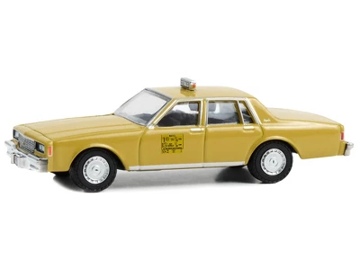 1981 Chevrolet Impala Taxi Yellow "Coming To America" (1988) Movie "Hollywood Series" 1/64 Diecast Model Car By Greenlight 3 1981 Chevrolet Impala Taxi Yellow "Coming To America" (1988) Movie "Hollywood Series" 1/64 Diecast Model Car By Greenlight