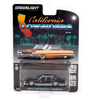 1987 Chevrolet Caprice Lowrider Custom Black With Graphics "California Lowriders" Release 1 1/64 Diecast Model Car By Greenlight 4 1987 Chevrolet Caprice Lowrider Custom Black With Graphics "California Lowriders" Release 1 1/64 Diecast Model Car By Greenlight - Image 2